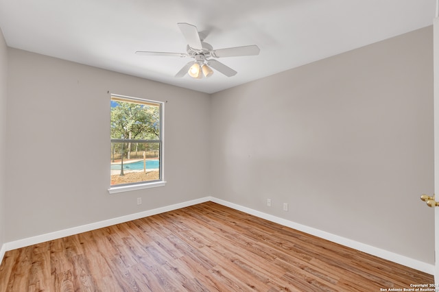 unfurnished room with light hardwood / wood-style floors and ceiling fan