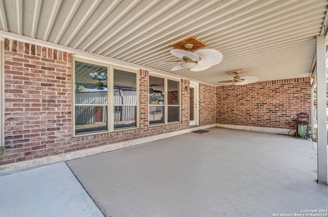 view of patio featuring ceiling fan