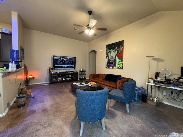 living room featuring ceiling fan and vaulted ceiling