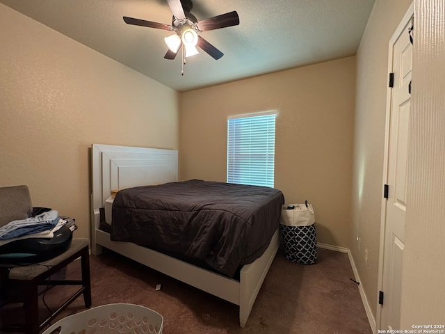 carpeted bedroom featuring ceiling fan