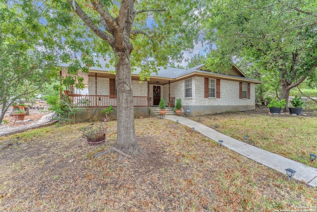 ranch-style home featuring covered porch