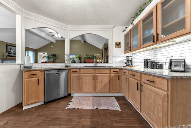 kitchen featuring light stone counters, ceiling fan, stainless steel dishwasher, vaulted ceiling with beams, and dark hardwood / wood-style flooring