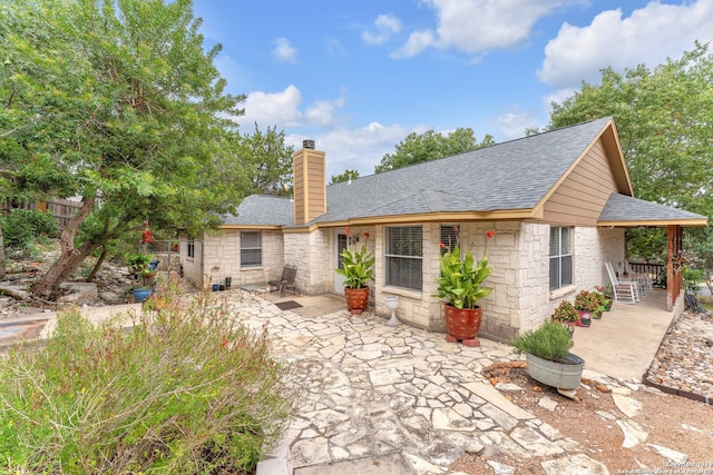 back of house featuring a patio area