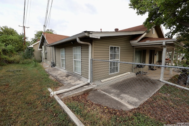 view of home's exterior featuring a patio