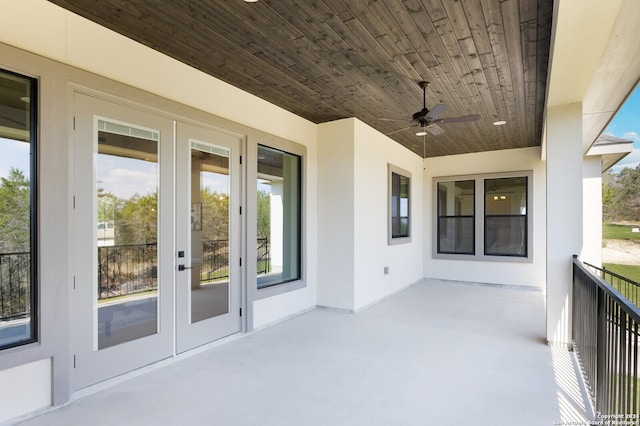 view of patio / terrace featuring french doors and ceiling fan