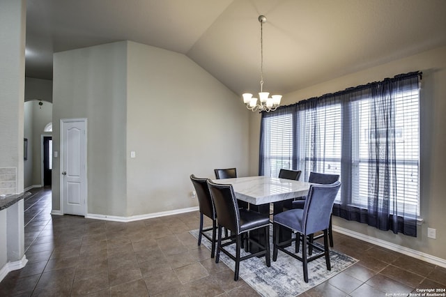 8811 Falcon Park, Converse, TX 78109 - dining area featuring vaulted ceiling, a chandelier, dark tile patterned floors, and baseboards