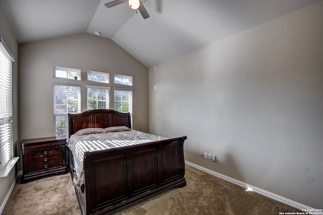 carpeted bedroom with lofted ceiling and ceiling fan