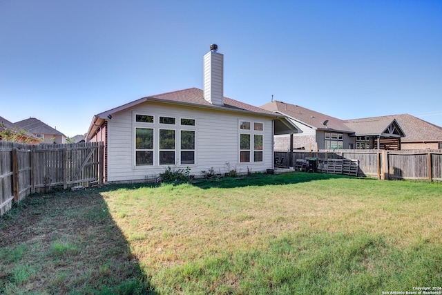 8811 Falcon Park, Converse, TX 78109 - back of property with a chimney