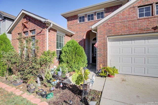 8811 Falcon Park, Converse, TX 78109 - traditional-style home with brick siding, a garage, and driveway