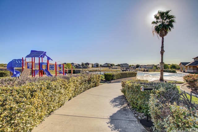 8811 Falcon Park, Converse, TX 78109 - community jungle gym with a residential view