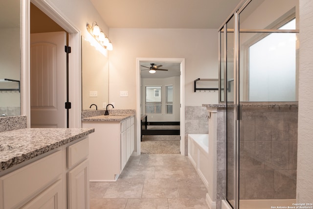 bathroom featuring independent shower and bath, vanity, tile patterned flooring, and ceiling fan