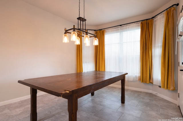 unfurnished dining area with light tile patterned floors