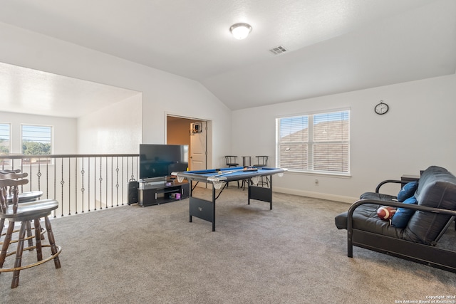 game room with carpet flooring and lofted ceiling