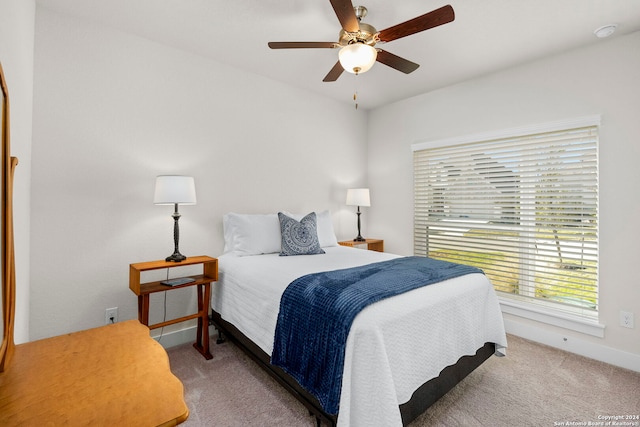 bedroom featuring ceiling fan and carpet flooring