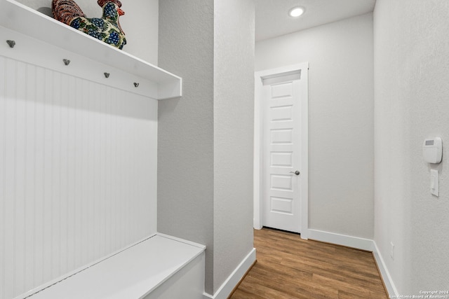 mudroom with hardwood / wood-style floors