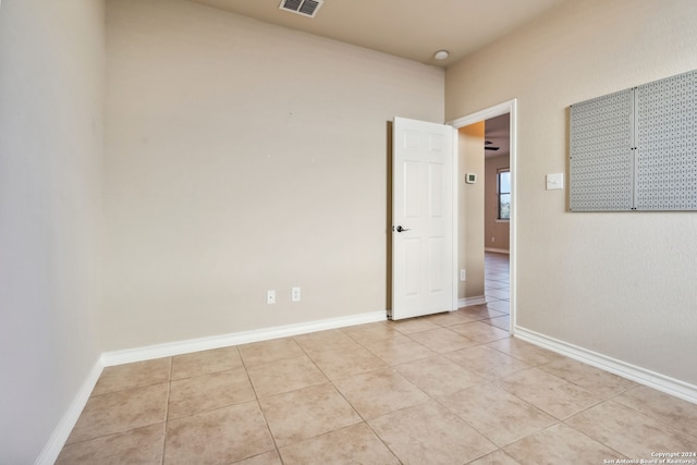 view of tiled spare room