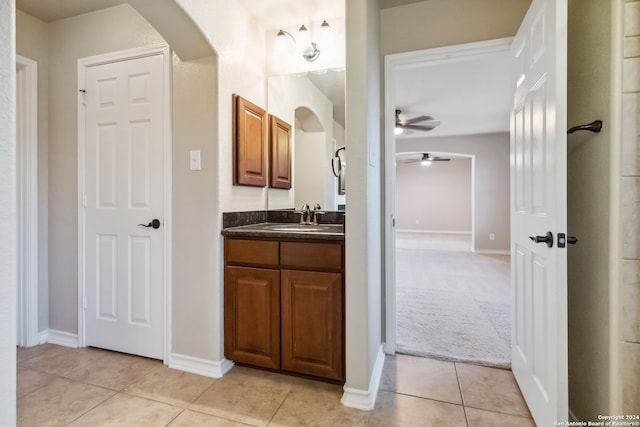 bathroom with vanity, ceiling fan, and tile patterned floors