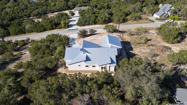 2920 Rocky Ridge Loop, Canyon Lake, TX 78133 - aerial view of property and surrounding area with a forest