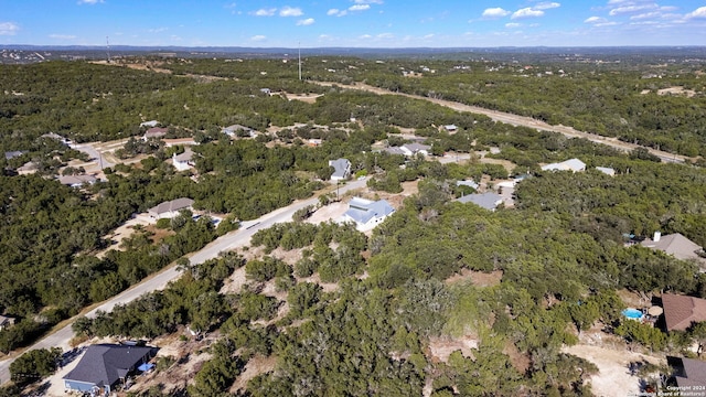 2920 Rocky Ridge Loop, Canyon Lake, TX 78133 - aerial overview of property's location with a forest
