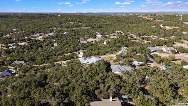 2920 Rocky Ridge Loop, Canyon Lake, TX 78133 - aerial view of property's location with a heavily wooded area