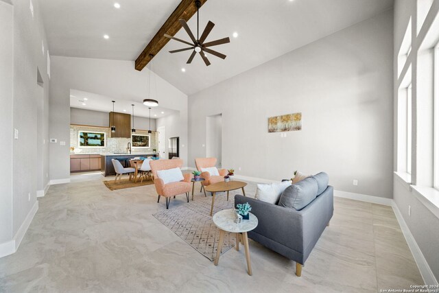 2920 Rocky Ridge Loop, Canyon Lake, TX 78133 - living area featuring beam ceiling, ceiling fan, recessed lighting, baseboards, and high vaulted ceiling