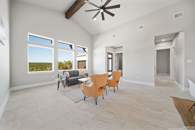 2920 Rocky Ridge Loop, Canyon Lake, TX 78133 - living area with beam ceiling, high vaulted ceiling, a ceiling fan, attic access, and baseboards