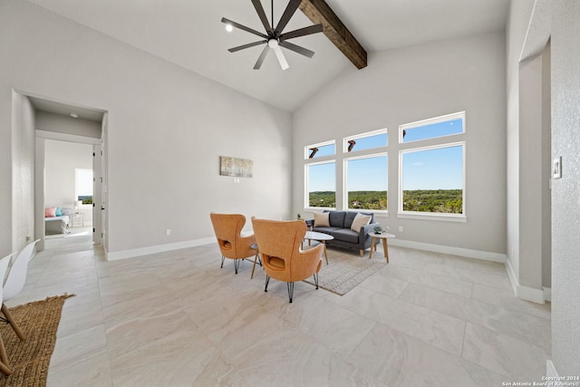2920 Rocky Ridge Loop, Canyon Lake, TX 78133 - living area with beamed ceiling, a ceiling fan, high vaulted ceiling, and baseboards