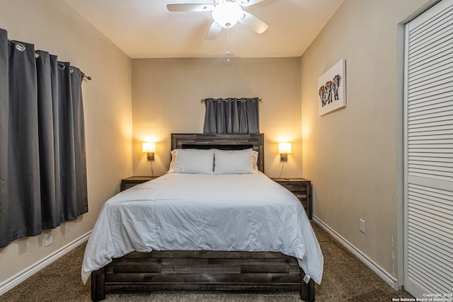 bedroom with ceiling fan and dark colored carpet