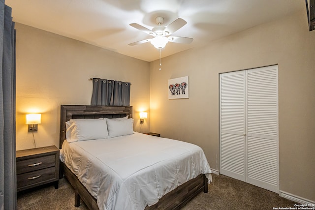 carpeted bedroom with ceiling fan and a closet