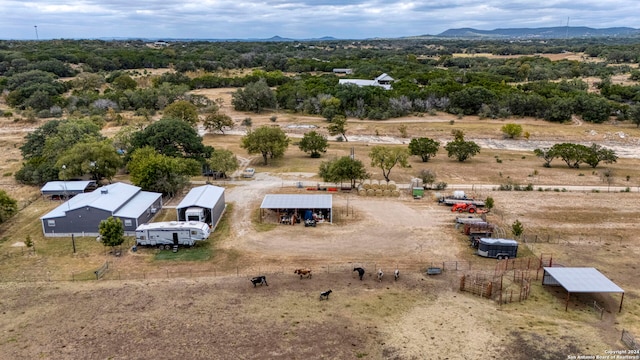 aerial view featuring a mountain view and a rural view