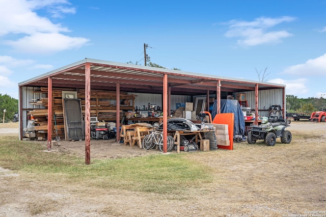 view of outbuilding featuring a yard