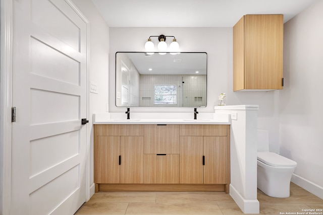 bathroom featuring walk in shower, vanity, toilet, and hardwood / wood-style floors