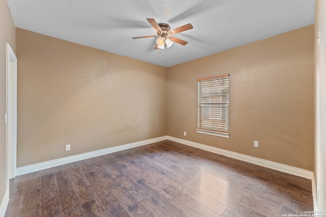 spare room with hardwood / wood-style floors, ceiling fan, and a textured ceiling