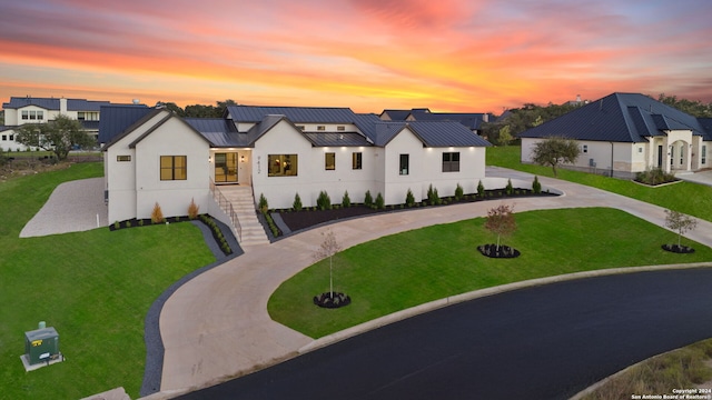 modern farmhouse with a yard