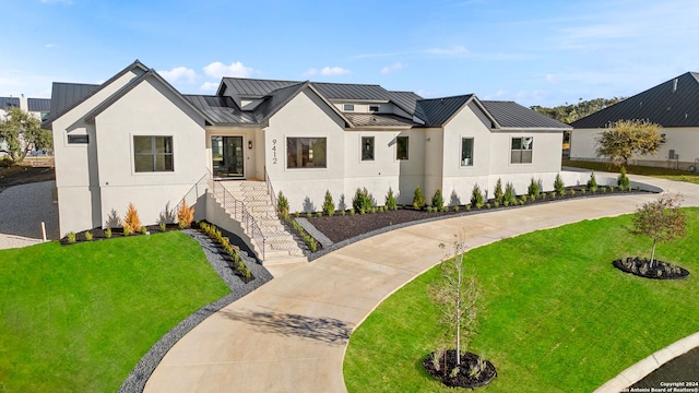 modern farmhouse featuring a front lawn