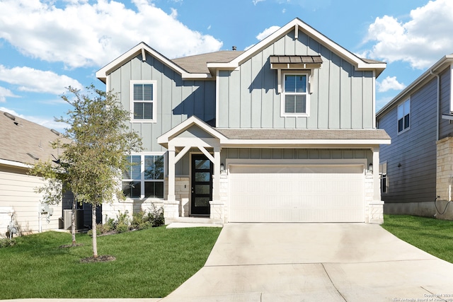 view of front facade featuring a garage and a front yard