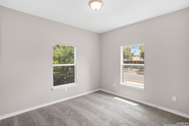 view of carpeted spare room