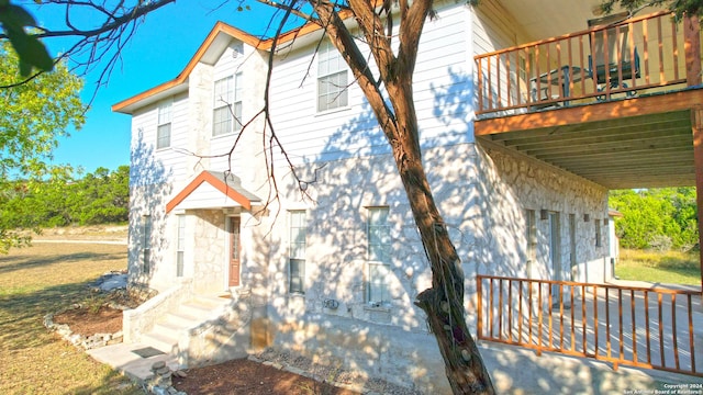 34970AND34900 Smithson Valley Rd, Bulverde, TX 78163 - view of side of home with a deck