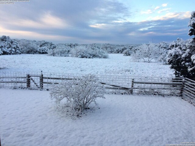 34970AND34900 Smithson Valley Rd, Bulverde, TX 78163 - yard layered in snow with fence