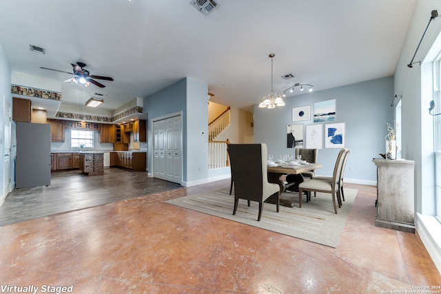 34970AND34900 Smithson Valley Rd, Bulverde, TX 78163 - dining space with stairway, a chandelier, ceiling fan, and baseboards