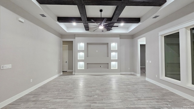 foyer entrance with beam ceiling, ceiling fan, light hardwood / wood-style floors, and coffered ceiling