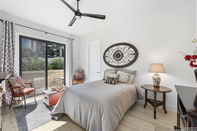 bedroom with access to outside, light wood-type flooring, and ceiling fan