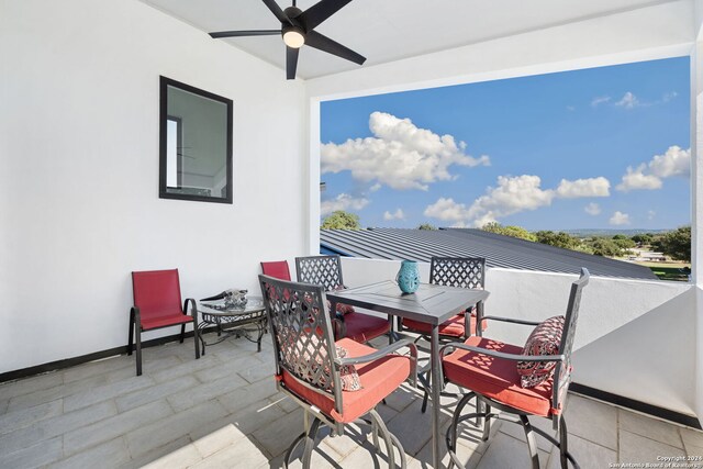 view of patio with ceiling fan