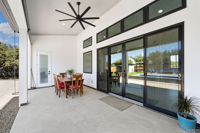 view of patio / terrace featuring ceiling fan