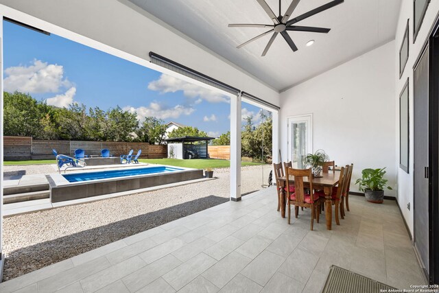 view of patio featuring ceiling fan