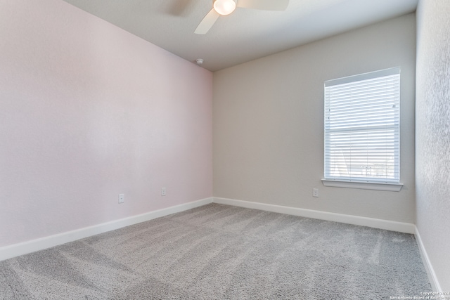 unfurnished room featuring carpet flooring and ceiling fan