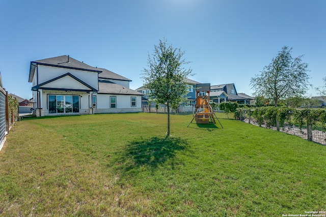 view of yard with a playground