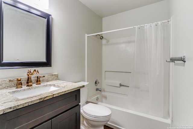 full bathroom with vanity, toilet, and shower / bathtub combination with curtain