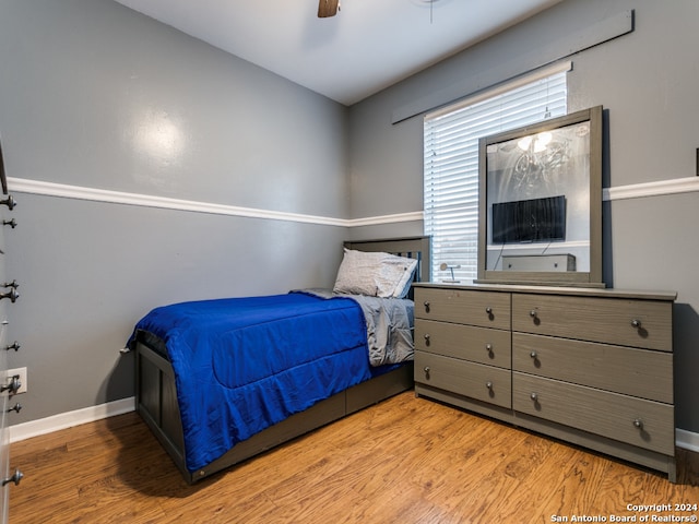 bedroom featuring light wood-type flooring and ceiling fan