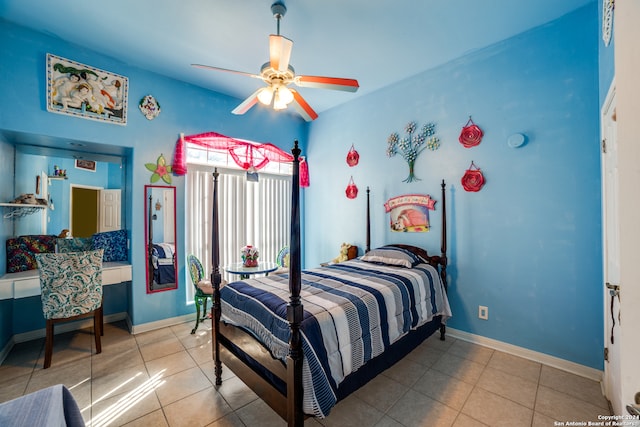 bedroom with ceiling fan and light tile patterned floors